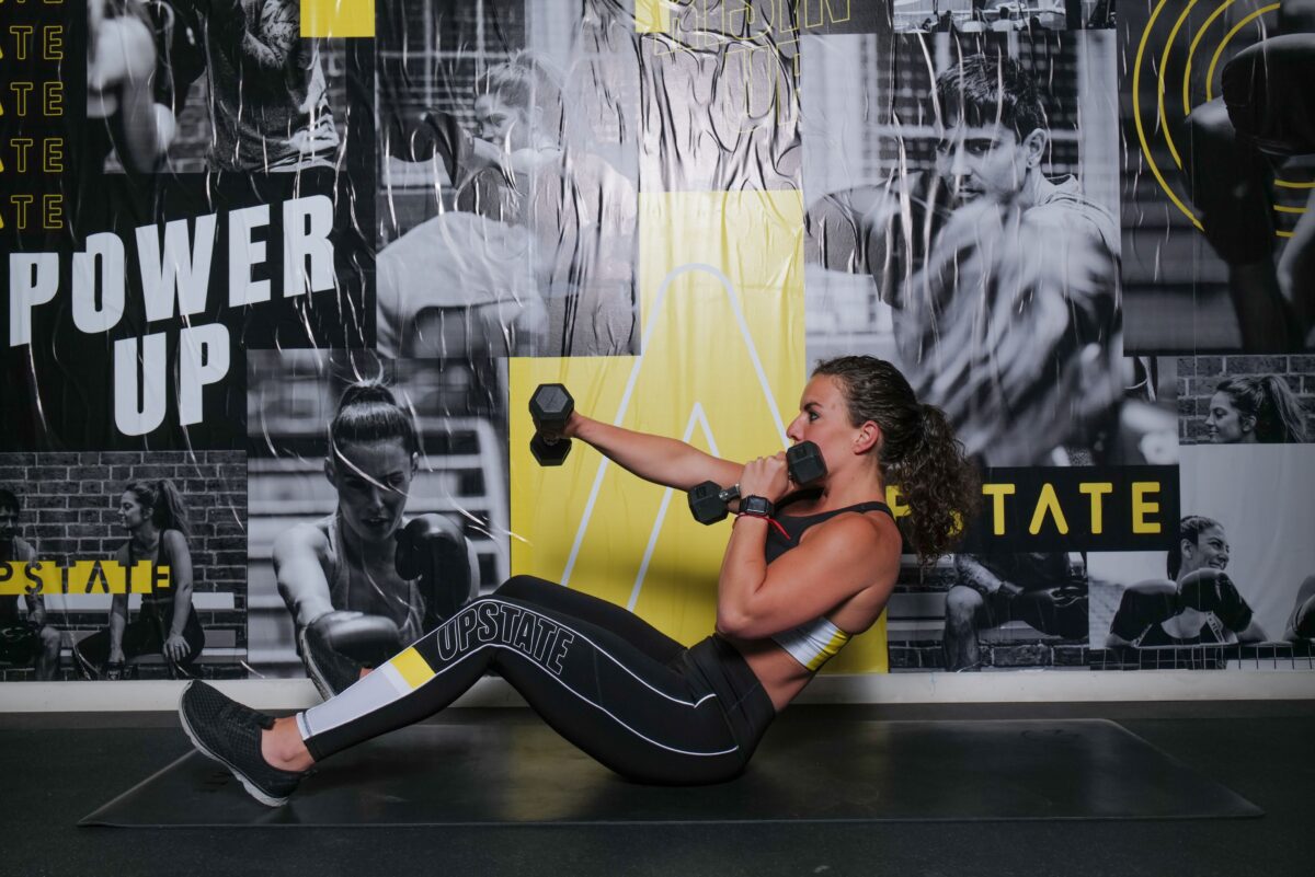 Upstater builds strength using weights in Upstate's cool boxing room.